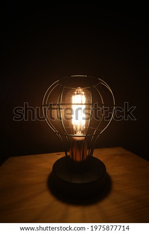 Modern table lamp with vintage light bulb