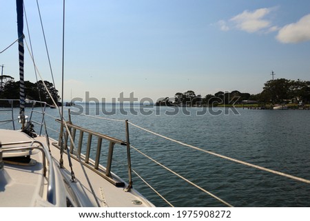 sailing boat on the water and blue sky