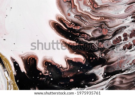 Acrylic Fluid Art. Brown and black waves and stains. Abstract marble agate stone background or texture