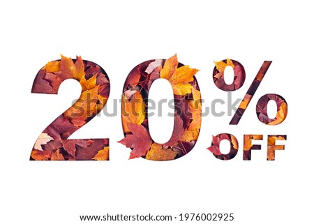 Paper cut 20 percent off text filled with texture of yellow and red autumn fall maple leaves isolated on white background. Autumn flyer, banner or poster design template. Fall shopping concept. Royalty-Free Stock Photo #1976002925