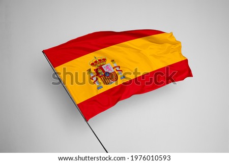 Spain flag isolated on white background with clipping path. close up waving flag of Spain. flag symbols of Spain. Spain flag frame with empty space for your text. Royalty-Free Stock Photo #1976010593