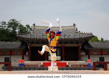 Korean traditional dance and mask . We call it “Taal - choom”. Royalty-Free Stock Photo #1976046554