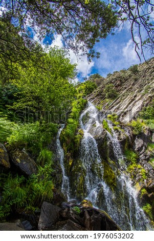 Majestic Waterfall In The Middle Of Nature Called: El Chorrituelo De Ovejuela. Located In Sierra De Gata, Las Hurdes, North Of Cáceres-Spain. Nature Royalty-Free Stock Photo #1976053202