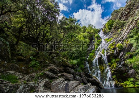 Majestic Waterfall In The Middle Of Nature Called: El Chorrituelo De Ovejuela. Located In Sierra De Gata, Las Hurdes, North Of Cáceres-Spain. Nature Royalty-Free Stock Photo #1976053286
