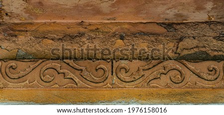 Reliefs abstraction of real texture, volumetric patterns in the form of stucco molding on buildings, houses, cultural objects, cast from concrete and painted with paint