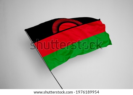 Malawi flag isolated on white background with clipping path. close up waving flag of Malawi. flag symbols of Malawi. Malawi flag frame with empty space for your text.