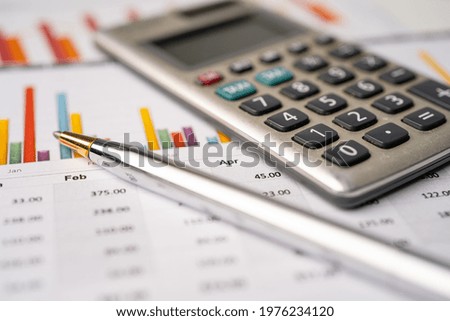 Calculator on graph paper. Finance development, Banking Account, Statistics, Investment Analytic research data economy, Stock exchange trading, Business company concept.