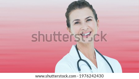 Composition of smiling female doctor with copy space on pink background. medicine and healthcare services concept digitally generated image.