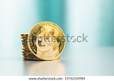 Golden dogecoin coin. Cryptocurrency dogecoin. Doge cryptocurrency. Royalty-Free Stock Photo #1976354984