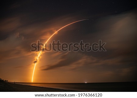Rocket Trail Under Stars at Cape Canaveral