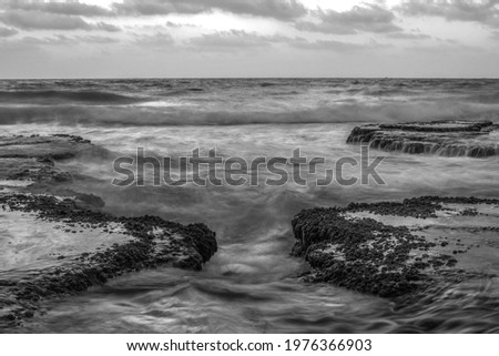 Black and white long exposure picture of the Mediterranean Sea near Haifa, Israel