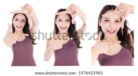 Happy woman making frame with fingers isolated on a white background