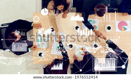 Creative visual of business people in the corporate staff meeting . Concept of digital technology for marketing data analysis and investment decision making .