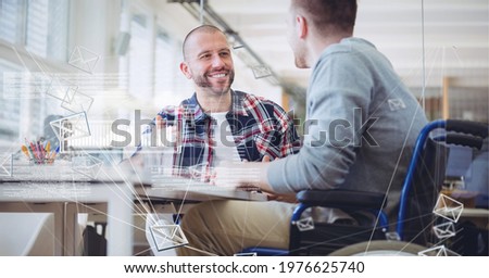Composition of data processing over two businessmen talking in office. global online business, networking and digital interface concept digitally generated image.