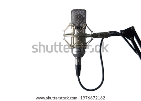 Silver studio condenser microphone, isolated on white background, with copy space on left