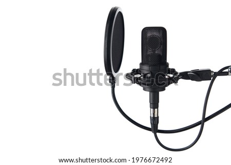 Black studio condenser microphone with pop up filter, isolated on white background, with copy space on left