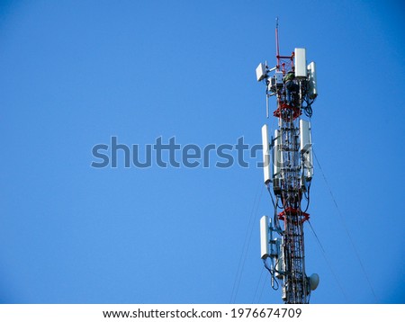 A picture of a technician doing maintenance on a cell site.