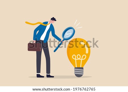 Validate startup idea that have potential to implement and success in real life, analyze and choose best business idea concept, smart businessman verify or validate light bulb idea and make approval. Royalty-Free Stock Photo #1976762765