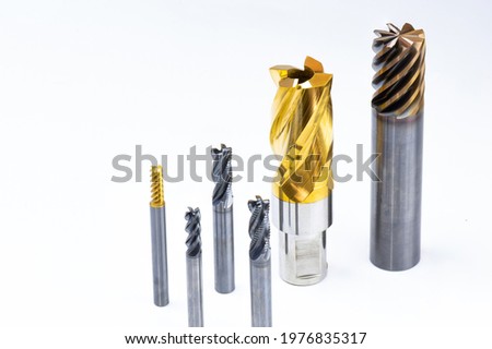 cutting tools special set. Reamer, end mill, drill. material Carbide and high speed steel, coating Titanium nitride. isolated on black background.	 Royalty-Free Stock Photo #1976835317