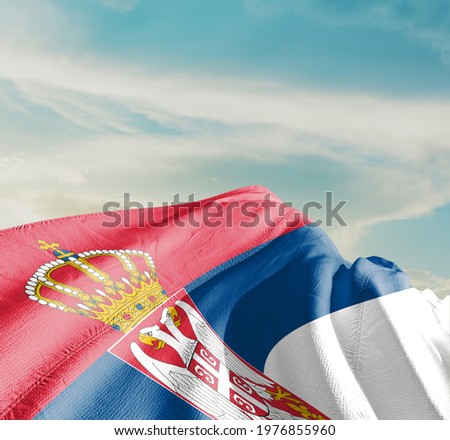 Serbia waving flag in the sky.