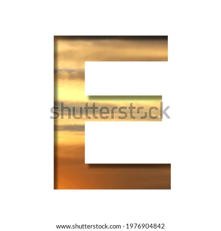 Font on the sunset sky. The letter E cut out of paper on the background of the colorful sky at beautiful sunset. Set of decorative natural fonts.