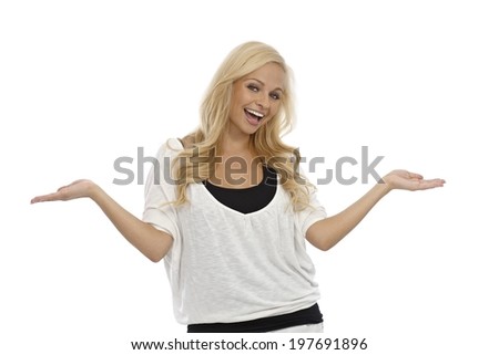 Happy blonde woman laughing, holding arms wide open.