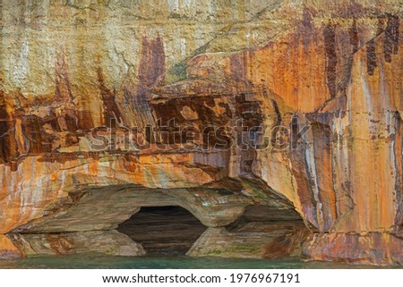 Abstract landscape of a mineral stained cliff along the eroded sandstone shoreline of Lake Superior, Pictured Rocks National Lakeshore, Michigan’s Upper Peninsula, USA
