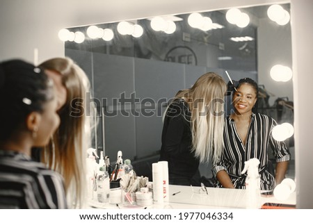 African girl doing eyebrow correction
