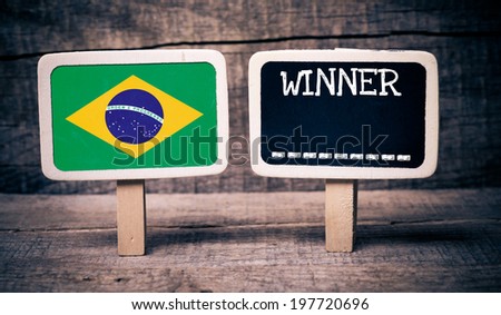 Brazil flag soccer 2014 Winner Small wooden framed blackboards on wooden background 