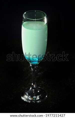 Blue Eye Cocktail on black background
