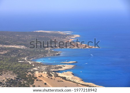View from above to Cyprus island sea coast with blue lagoon. Akamas cape landscape