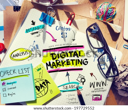 Office Desk with Tools and Notes About Digital Marketing