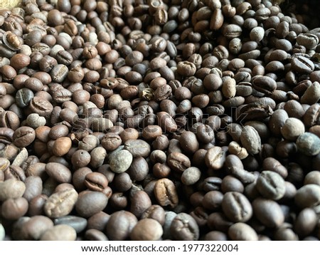 A sack full of fresh coffee beans ready for crushing inside the estate factory in Madikeri, Karnataka