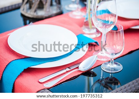 decorated table with dinner in the garden