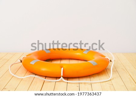 Lifebuoy ring on wooden table