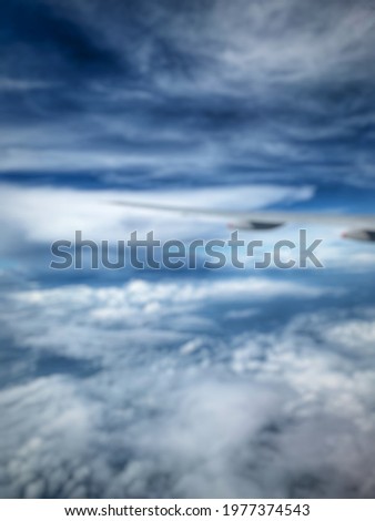 Defocused abstract background of clouds from an aircraft