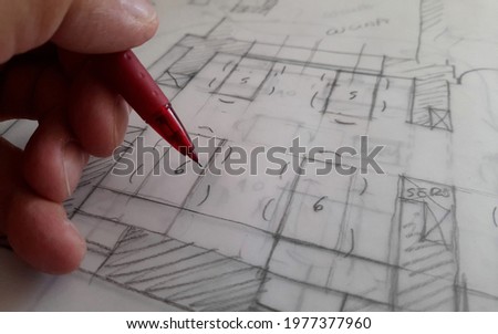 Architect who design freehand in his professional studio