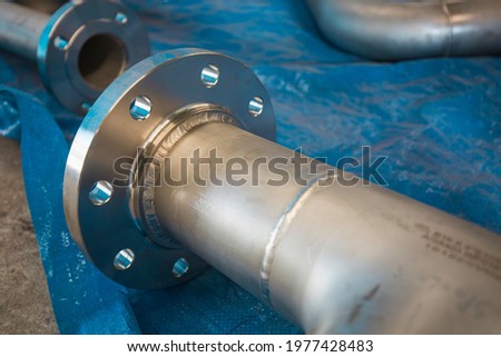 Stainless steel piping flange valve component GTAW TIG welded joint pressure vessel fabrication Royalty-Free Stock Photo #1977428483