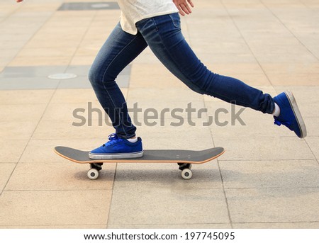 speeding skateboarding woman at city 