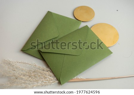 envelope green for wedding invitation with flowers