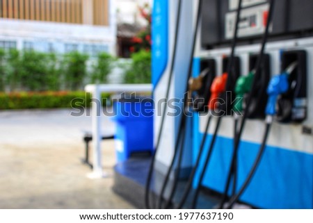 The nozzle in the gas station picture is blurry.