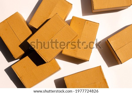 Brown cardboard boxes on white background.