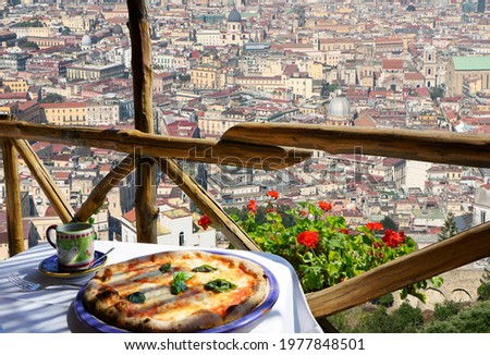 Pizza place terrace with Naples view, Italy Royalty-Free Stock Photo #1977848501