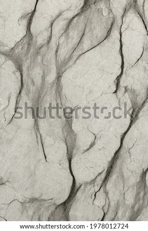 Natural grey marble texture pattern. Background and structure of raw stone.