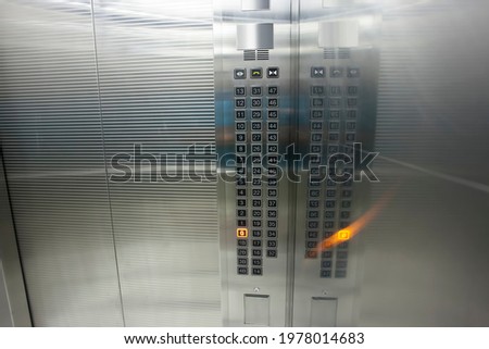 elevator buttons in a high rise building