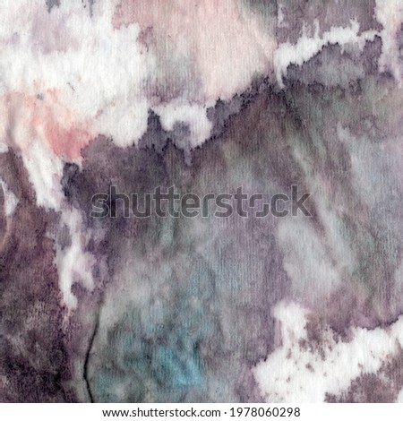 Abstract multicolored textile background — painting on fabric with colored spots, smudges and stains. Fluid texture resembles soft blanket, cotton or wool background in close up shot.