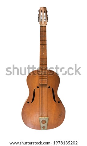 Old acoustic guitar isolated on white background
