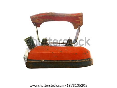 old iron for ironing red color isolated on white background