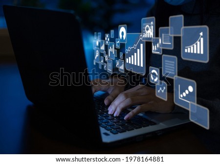 Business women use laptops for big data analysis and business intelligence marketing planning ideas