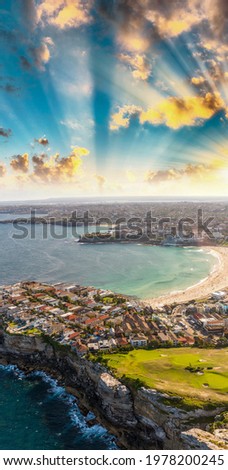 Sydney Bondi Beach. Sunset aerial view from helicopter.
